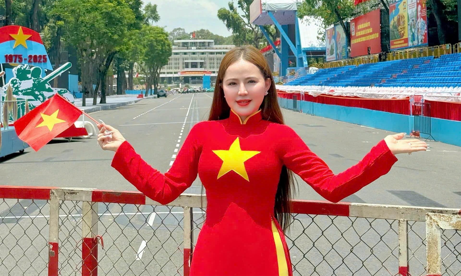 Hoa hậu Nguyễn Thị Bình trong tà áo dài sắc đỏ, hưởng ứng kỷ niệm 50 năm thống nhất đất nước 30/4
